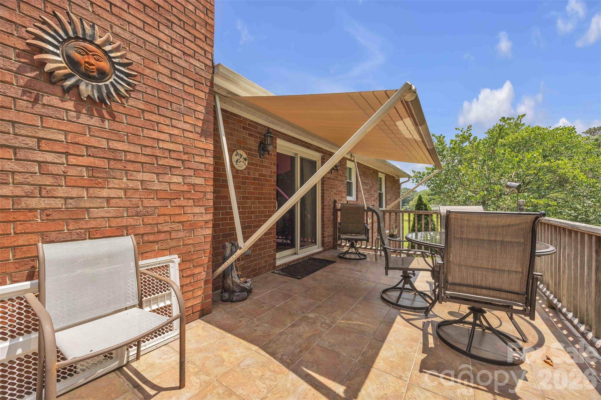 137 Proust Road Statesville, NC 28625 - Photo 39 of 47 a backyard of a house with table and chairs