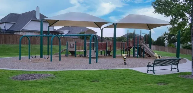 a view of a park with a bench