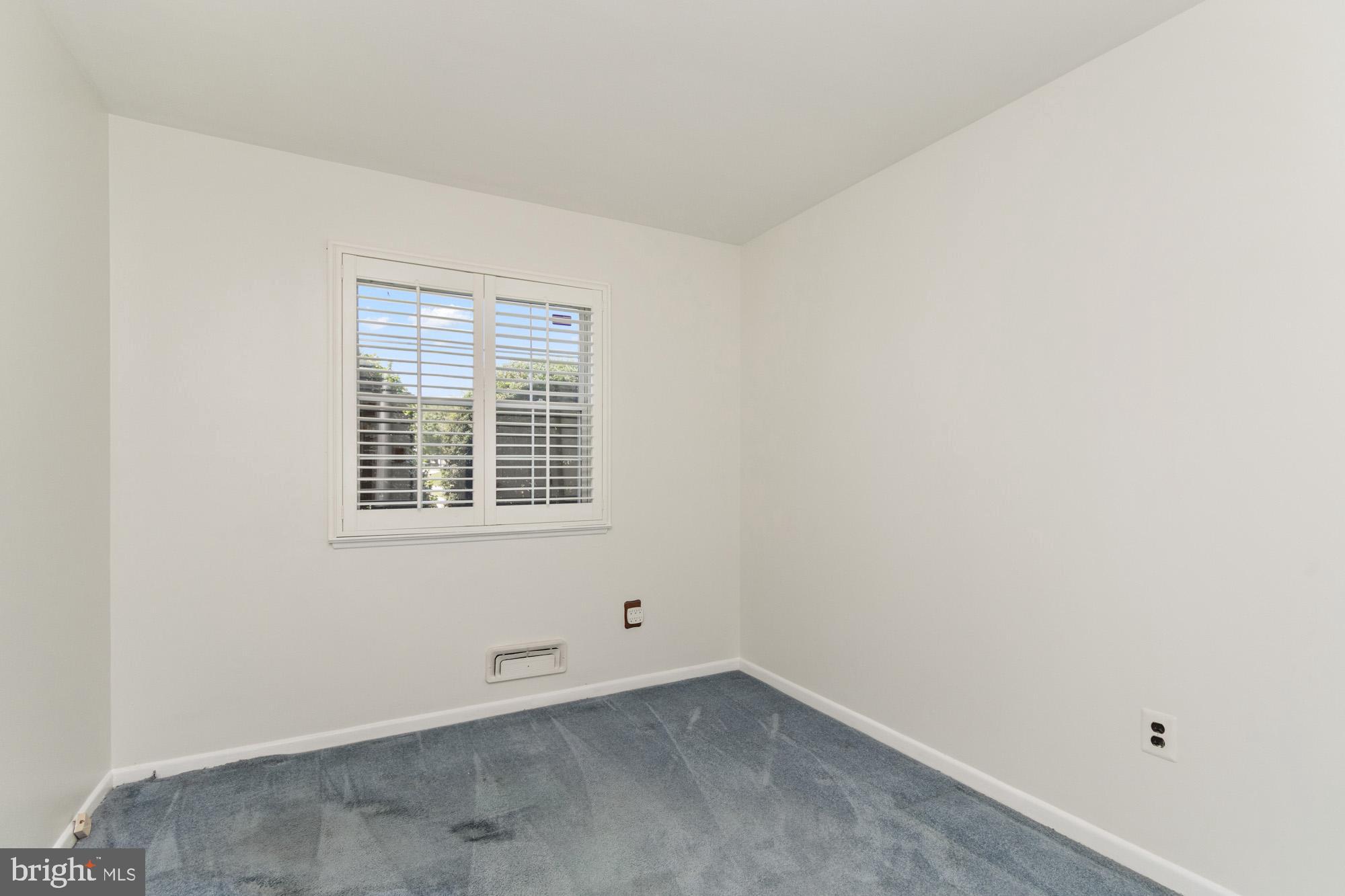 1429 Adamsview Road Baltimore, MD 21228 - Photo 17 of 44 an empty room with a window