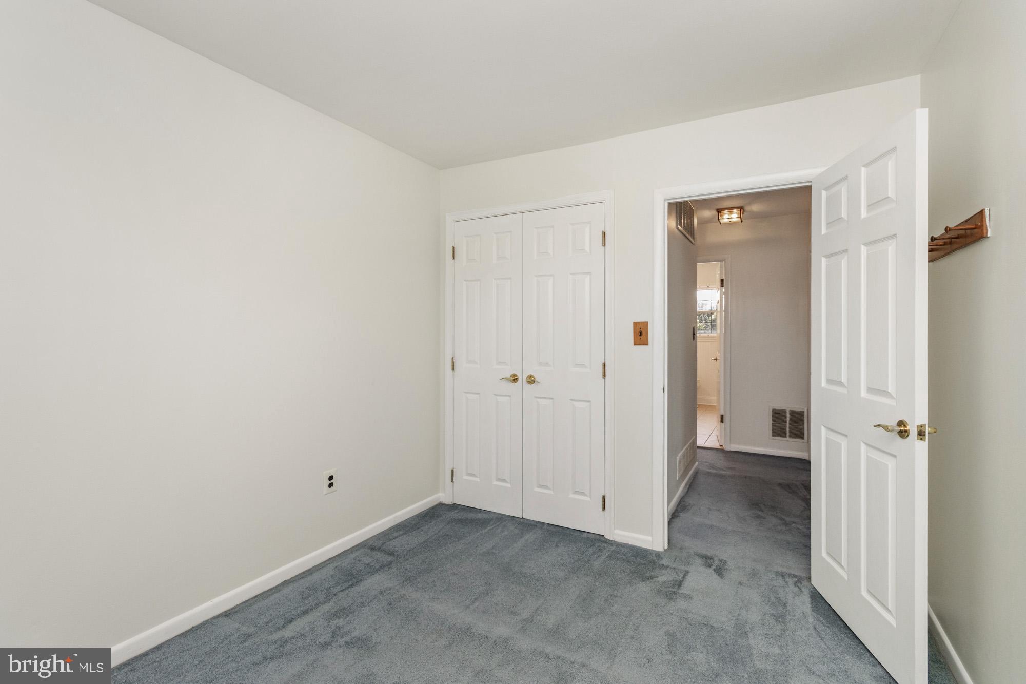 1429 Adamsview Road Baltimore, MD 21228 - Photo 18 of 44 an empty room with closet