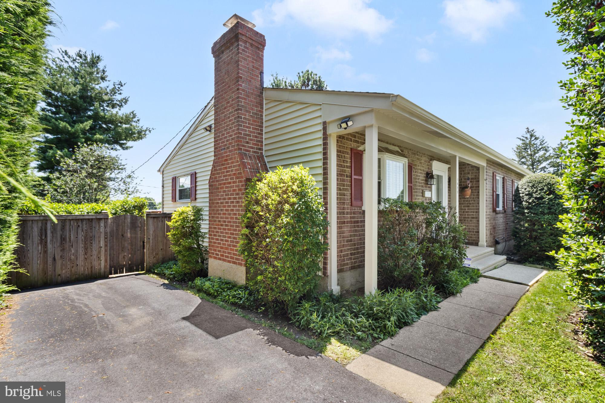 1429 Adamsview Road Baltimore, MD 21228 - Photo 2 of 44 a front view of a house with garden