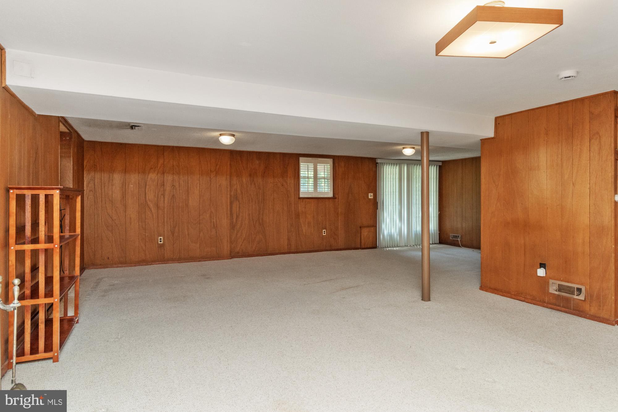 1429 Adamsview Road Baltimore, MD 21228 - Photo 25 of 44 an empty room with windows