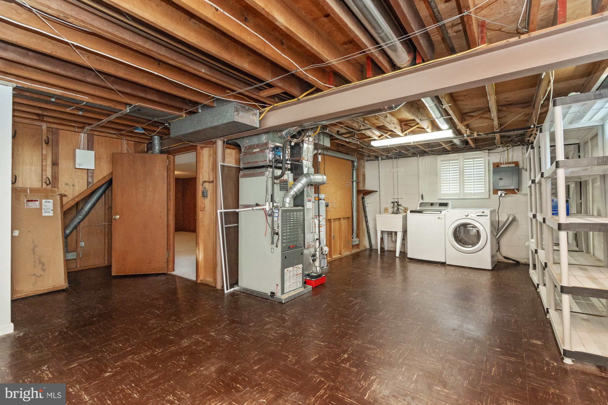 1429 Adamsview Road Baltimore, MD 21228 - Photo 27 of 44 a utility room with dryer and washer