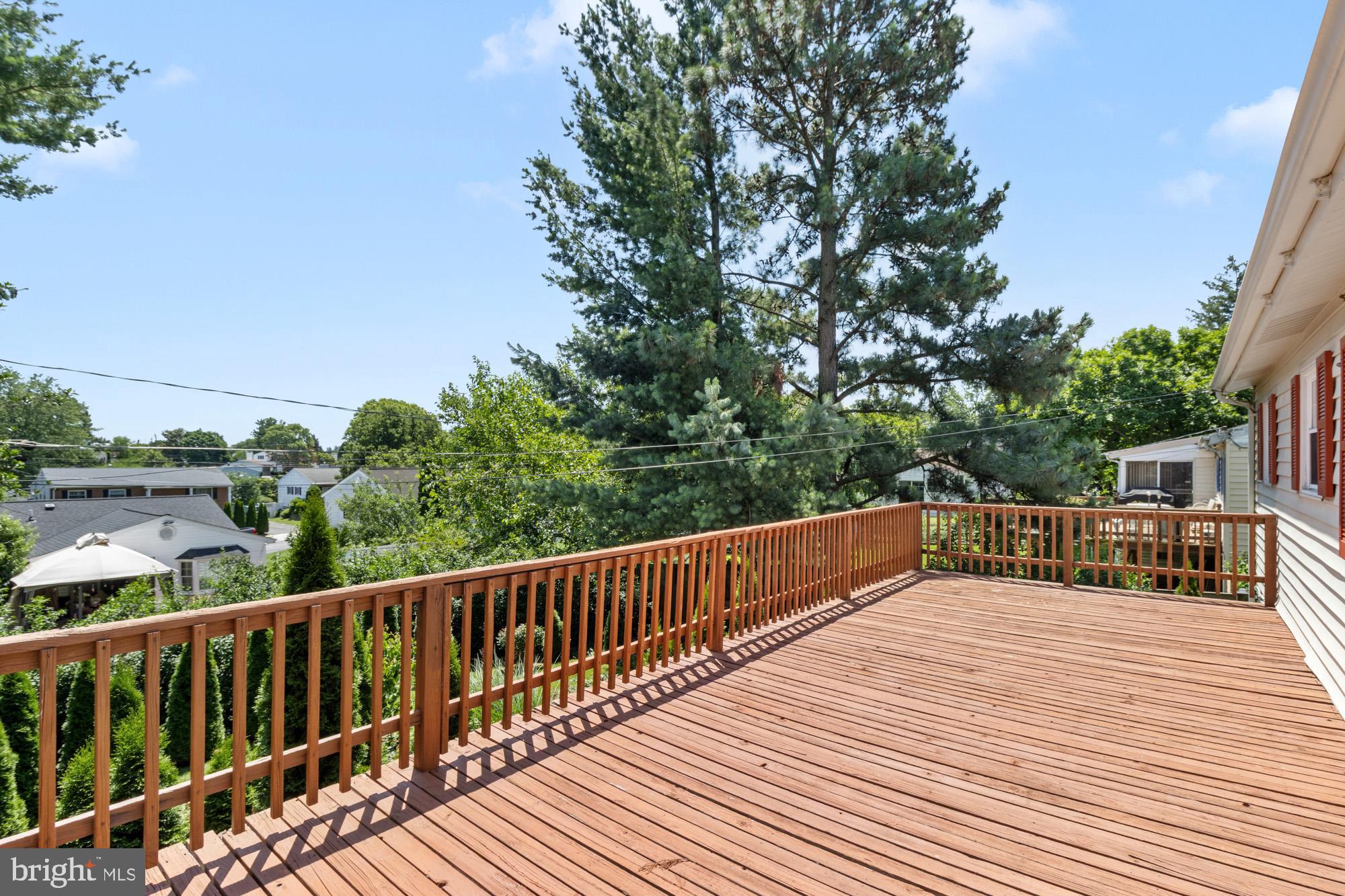 1429 Adamsview Road Baltimore, MD 21228 - Photo 35 of 44 a view of deck with patio and wooden fence