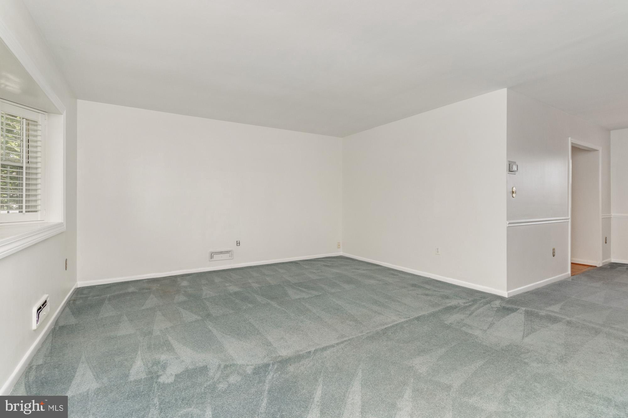 1429 Adamsview Road Baltimore, MD 21228 - Photo 4 of 44 a view of an empty room