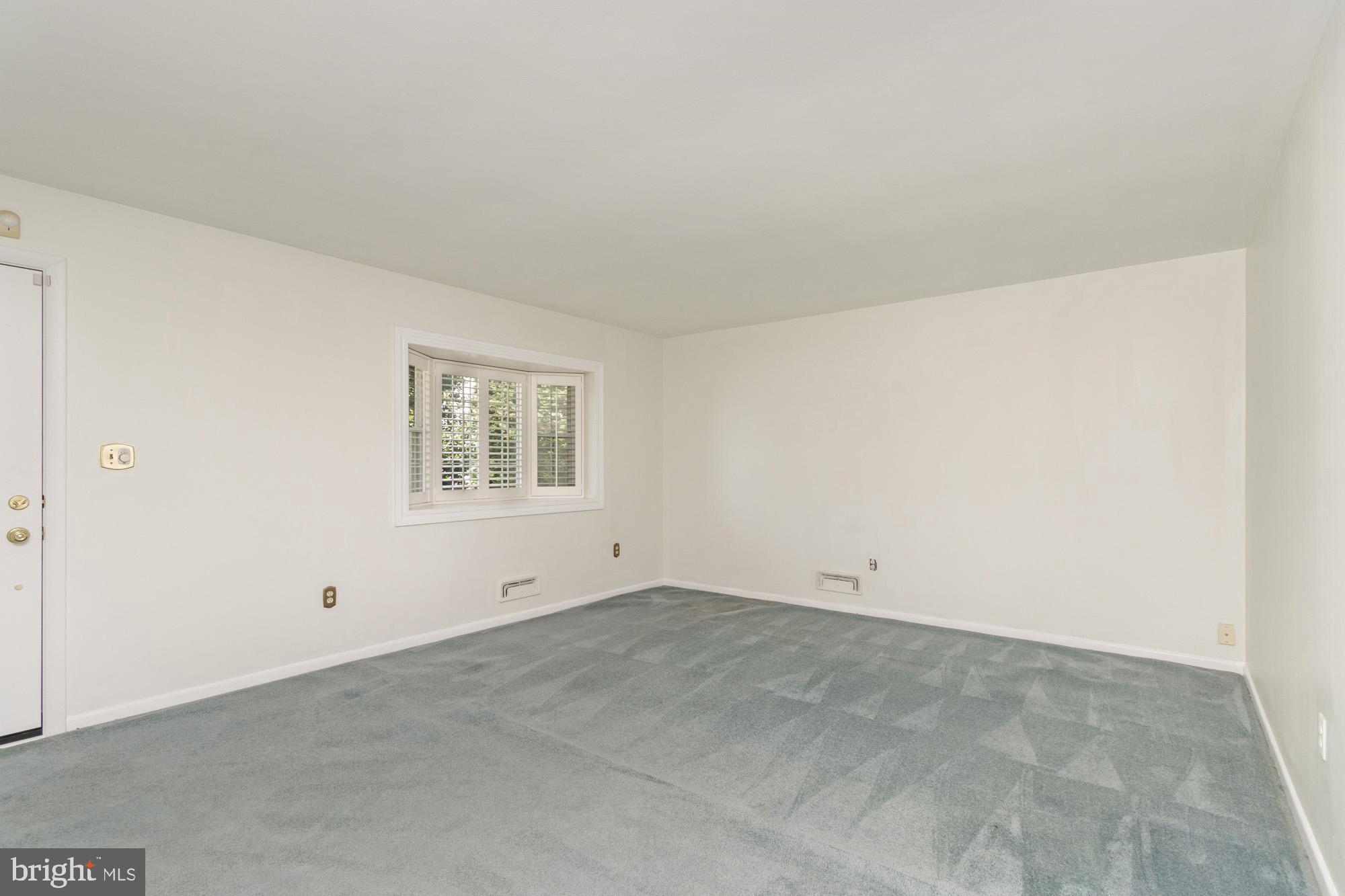 1429 Adamsview Road Baltimore, MD 21228 - Photo 7 of 44 an empty room with a window