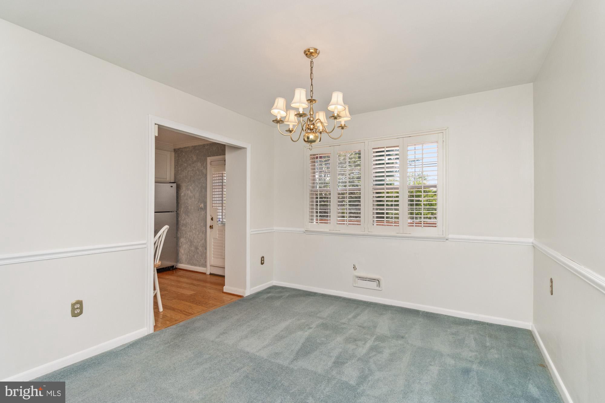 1429 Adamsview Road Baltimore, MD 21228 - Photo 9 of 44 a view of an empty room with a window