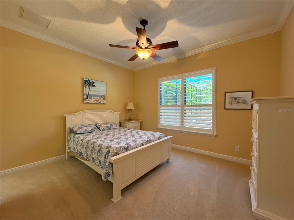 1024 West Beagle Run Loop Hernando, FL 34442 - Photo 22 of 44 a bedroom with a bed and window