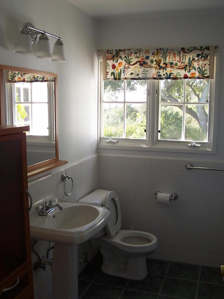 2020 Foothill Road Santa Barbara, CA 93105 - Photo 2 of 10 a bathroom with a sink toilet and window