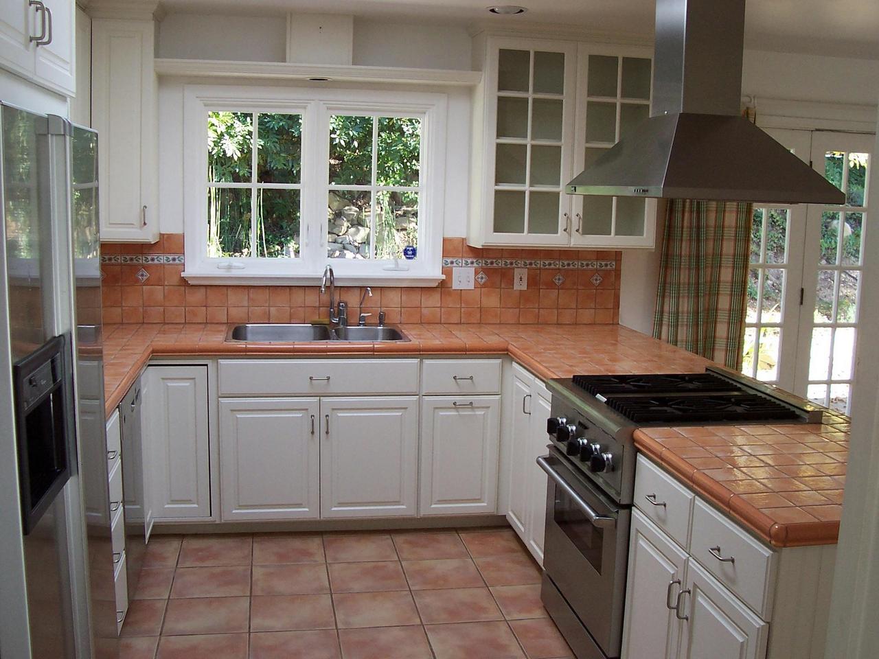 2020 Foothill Road Santa Barbara, CA 93105 - Photo 9 of 10 a kitchen with granite countertop a sink stove and cabinets