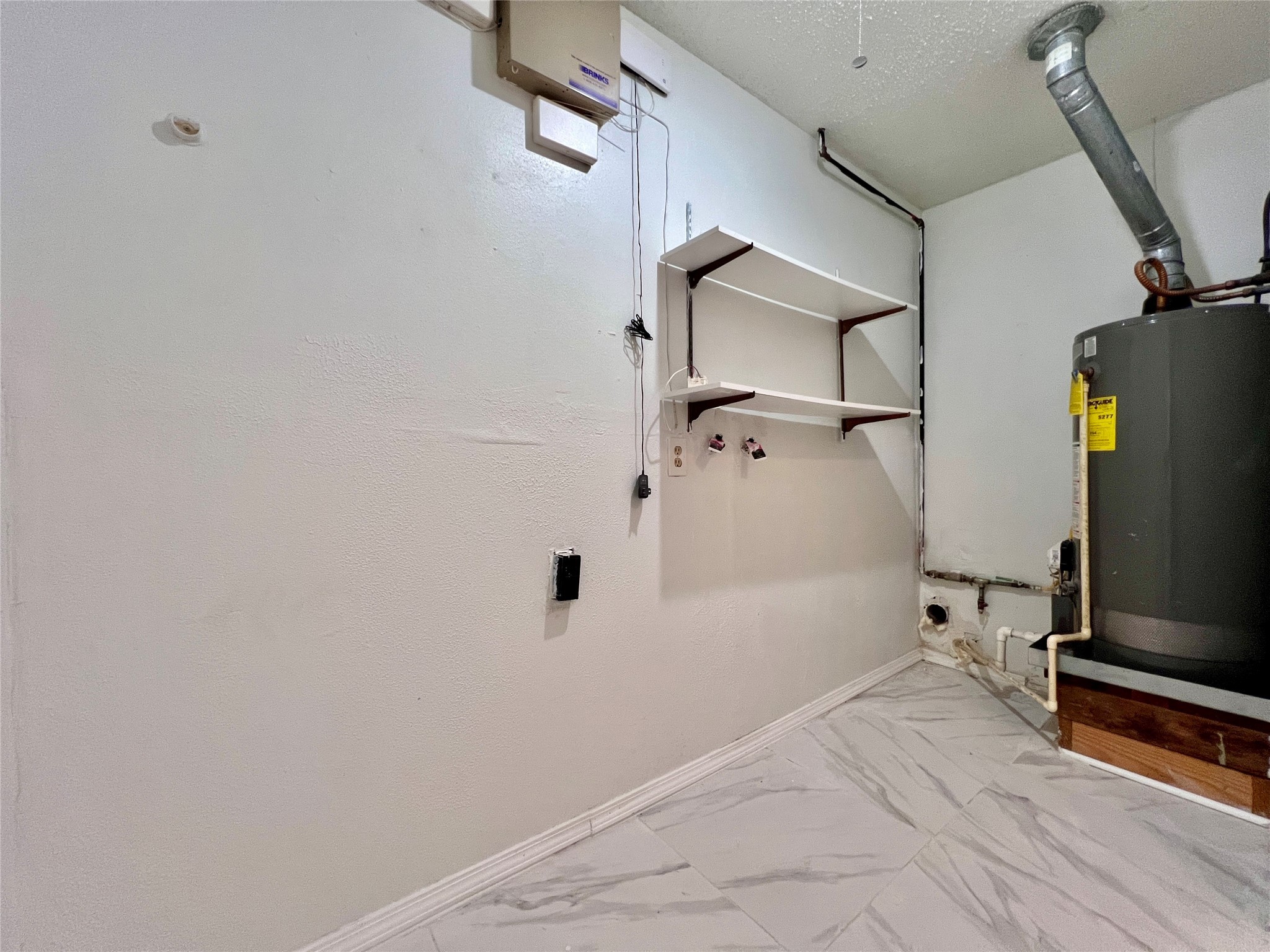 23111 Bayleaf Drive Spring, TX 77373 - Photo 22 of 28 a view of a room with wooden floor and windows