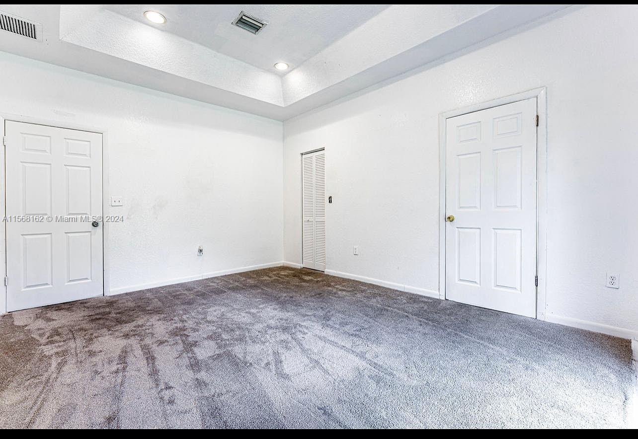 2320 Northwest 52nd Street, Unit A Miami, FL 33142 - Photo 4 of 8 a view of an empty room