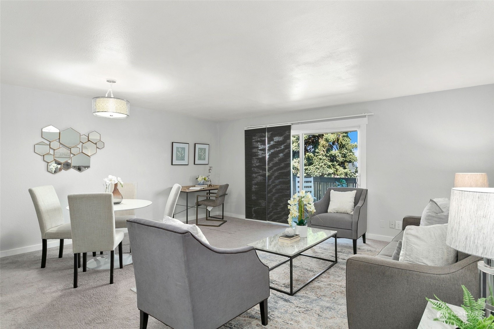 a dining room with furniture and window