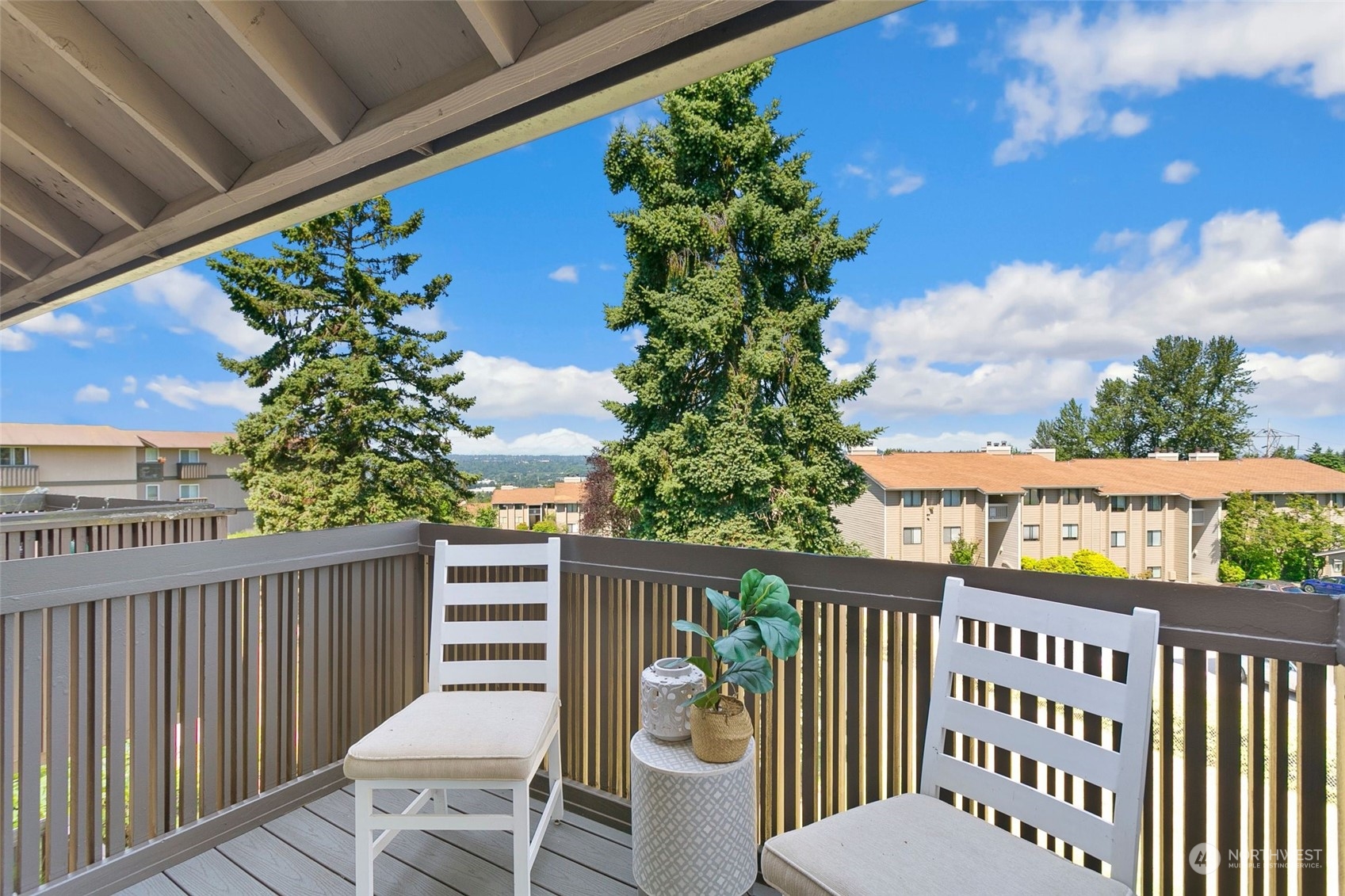 1425 South Puget Drive, Unit 308 Renton, WA 98055 - Photo 15 of 23 a view of a balcony with wooden floor