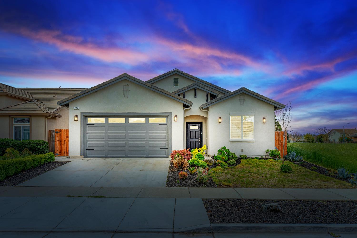 1234 Wildcat Drive Merced, CA 95348 - Photo 1 of 1 a front view of a house with a yard