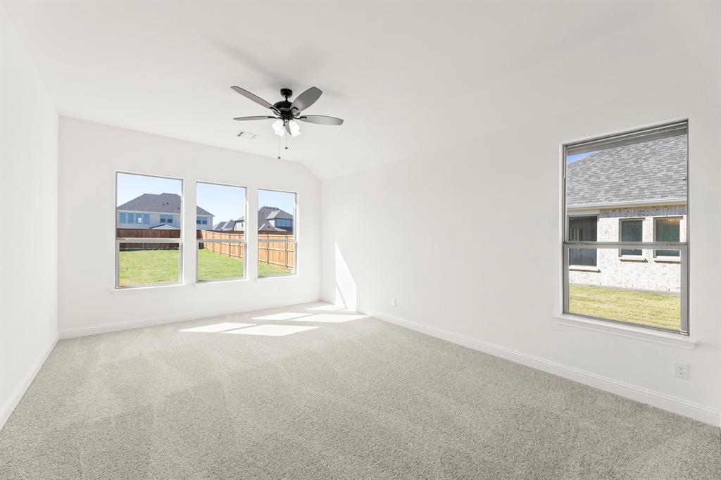 610 Tenor Drive Forney, TX 75126 - Photo 10 of 30 a view of an empty room with a window