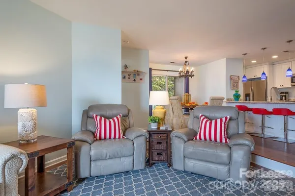 a living room with furniture and a couch