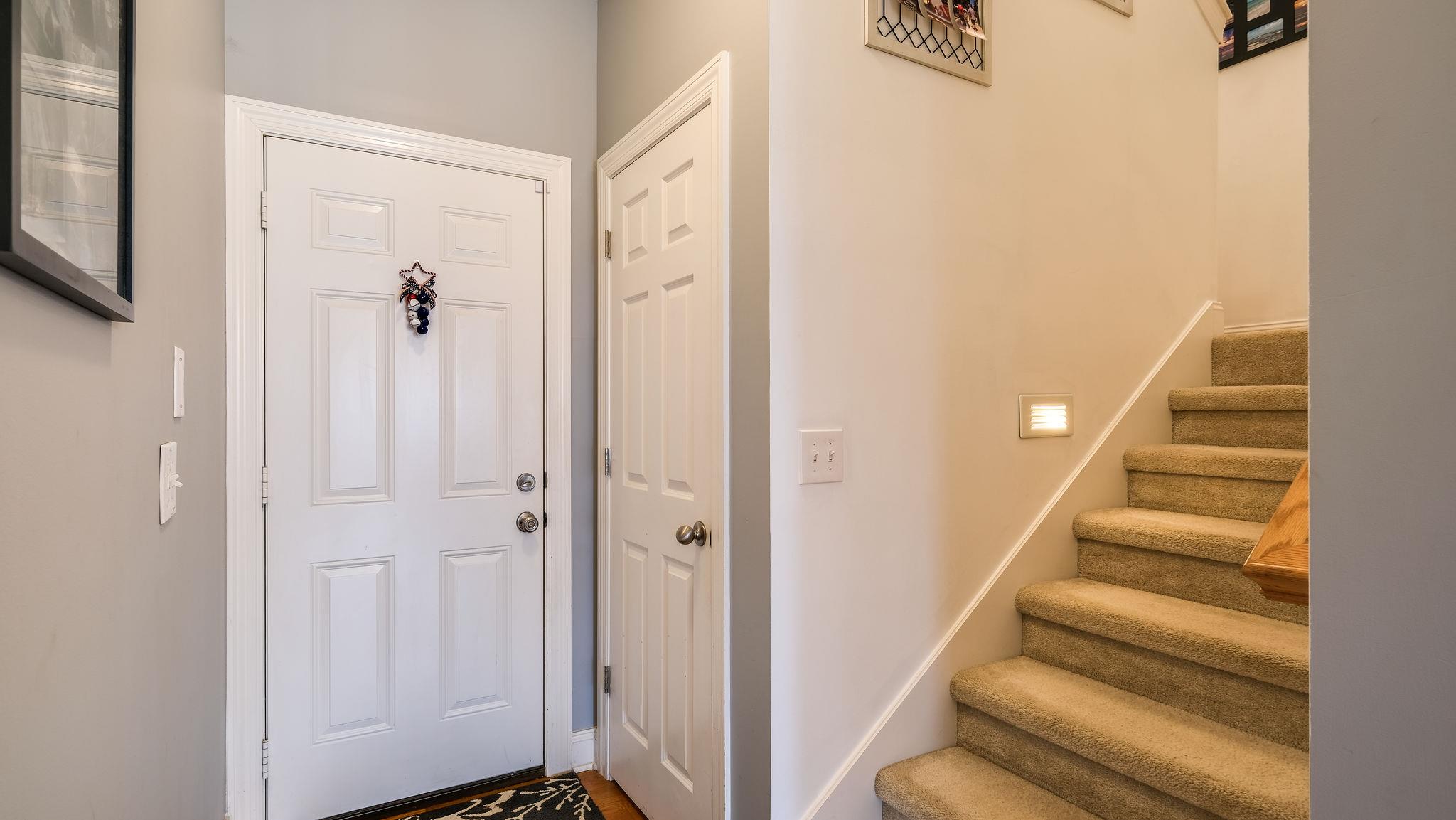 7920 Powells Chapel Road Murfreesboro, TN 37129 - Photo 15 of 29 a view of a hallway with wooden floor and entryway