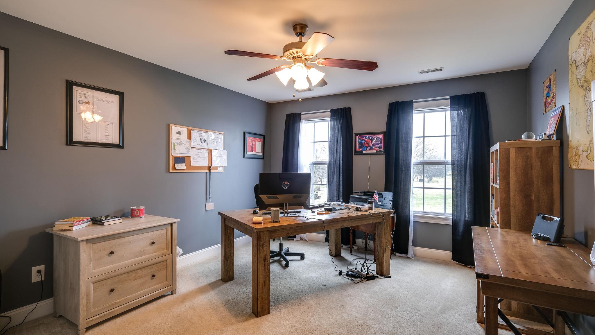 7920 Powells Chapel Road Murfreesboro, TN 37129 - Photo 18 of 29 a view of a workspace with furniture and a window