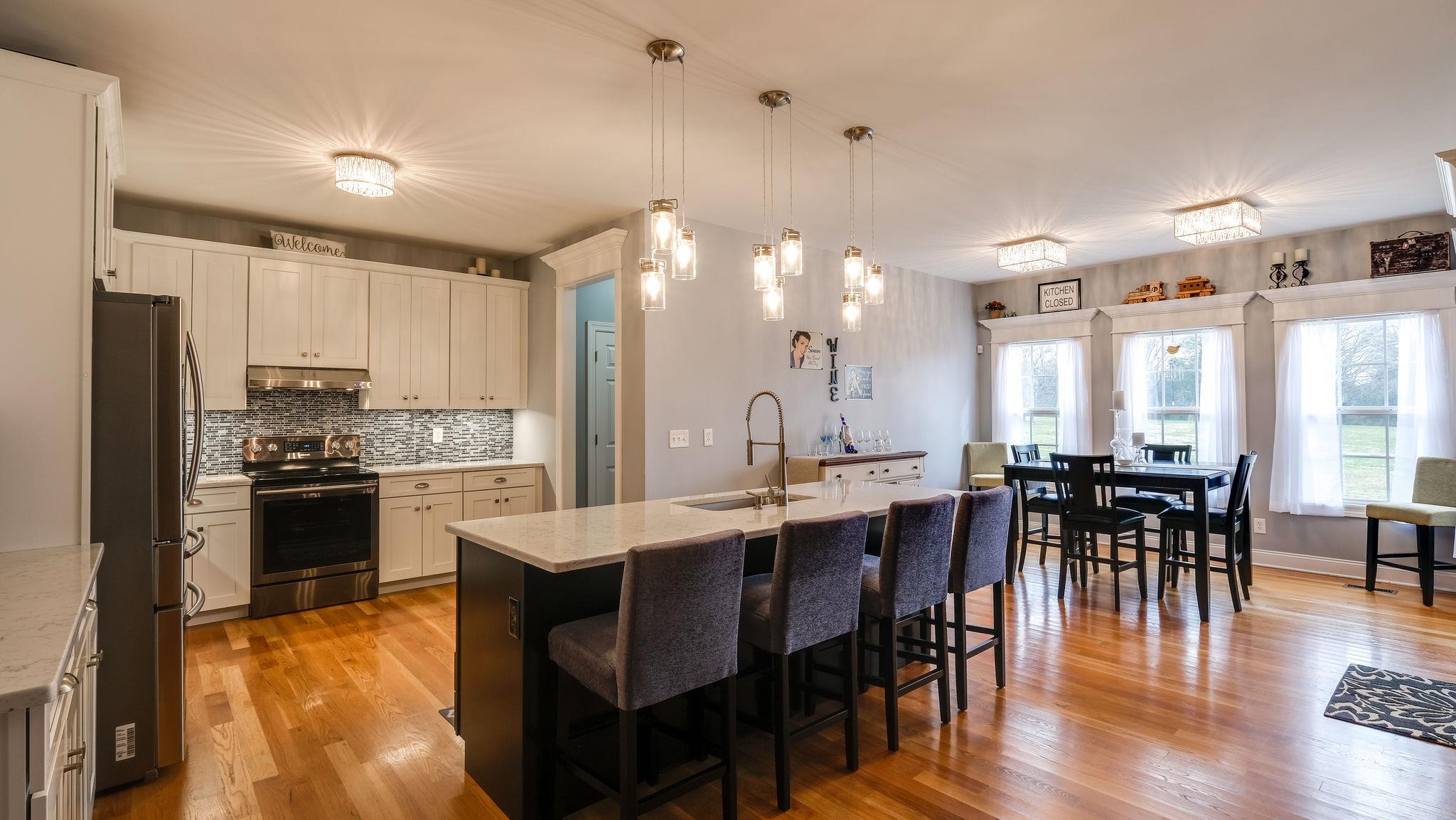 7920 Powells Chapel Road Murfreesboro, TN 37129 - Photo 6 of 29 a large kitchen with a table and chairs