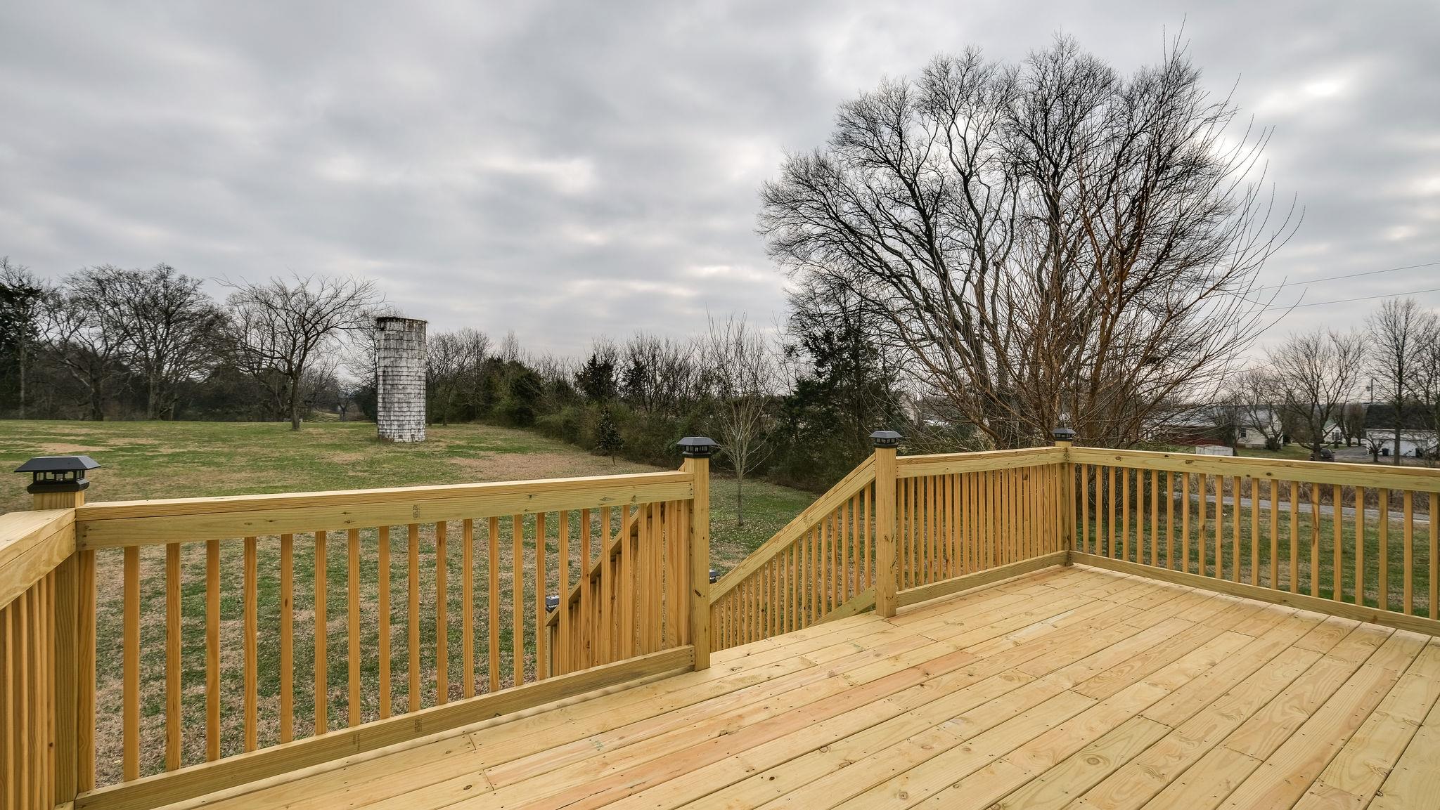 7920 Powells Chapel Road Murfreesboro, TN 37129 - Photo 10 of 29 a view of a balcony with wooden floor