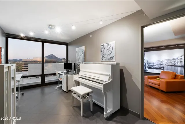 a view of a living room and dining room