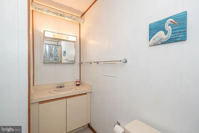 a bathroom with a shower and a toilet