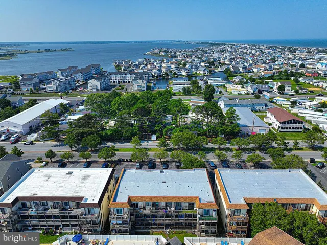 an aerial view of a house with a garden