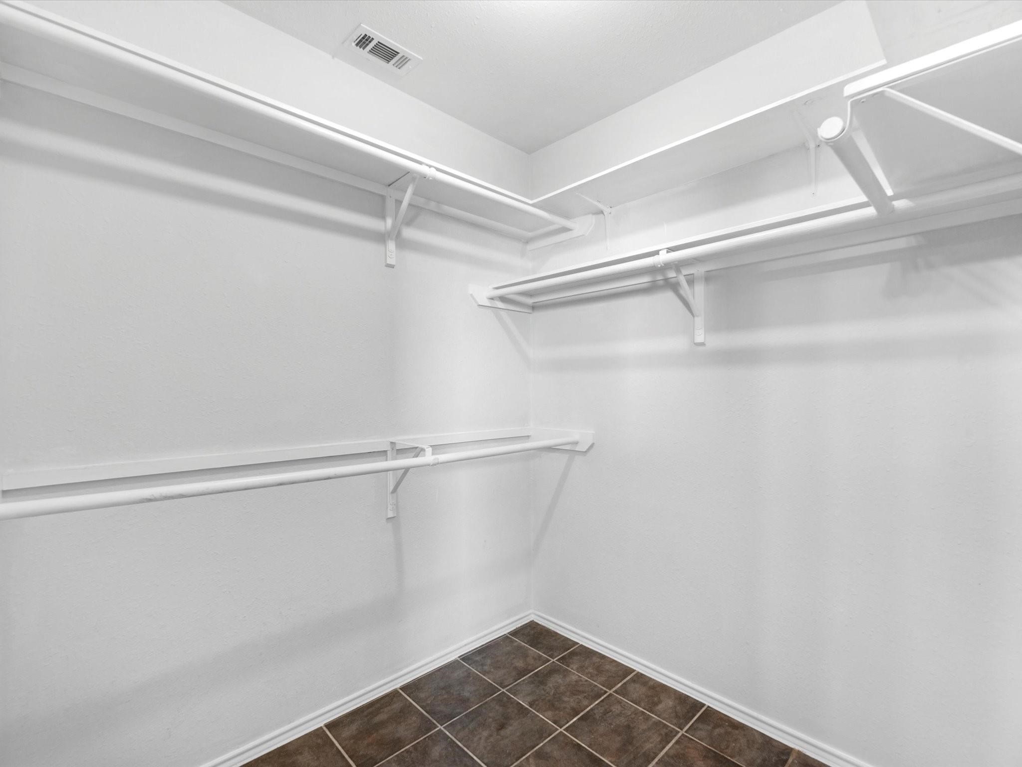 14306 Spring Marsh Court Cypress, TX 77429 - Photo 20 of 26 a view of an empty walk in closet