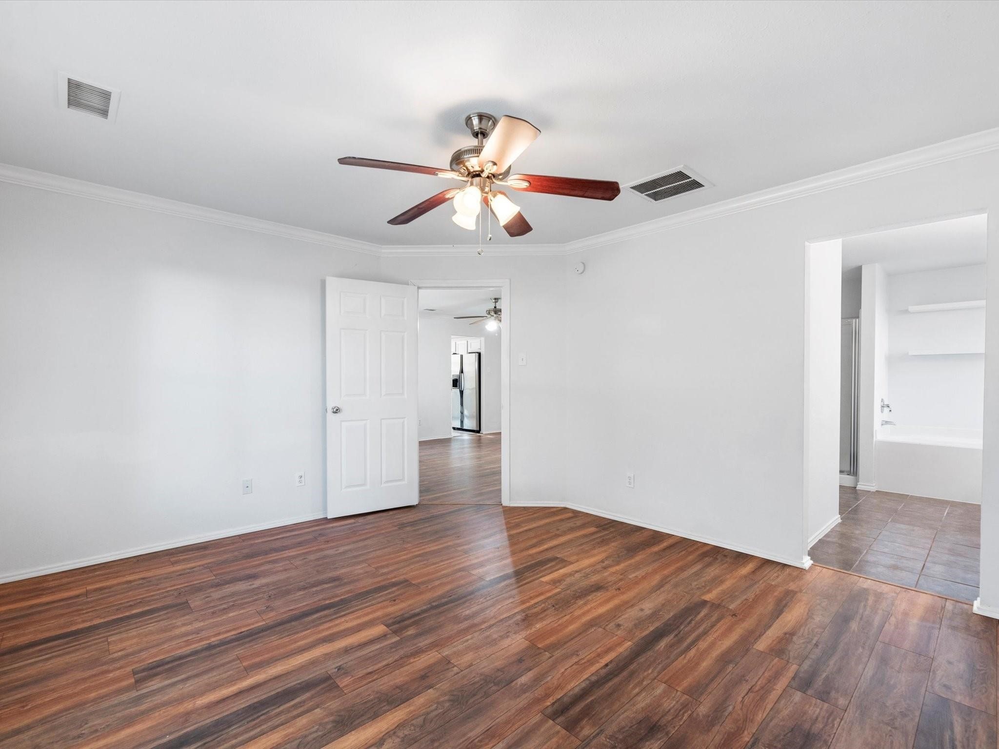 14306 Spring Marsh Court Cypress, TX 77429 - Photo 23 of 26 a view of empty room with wooden floor