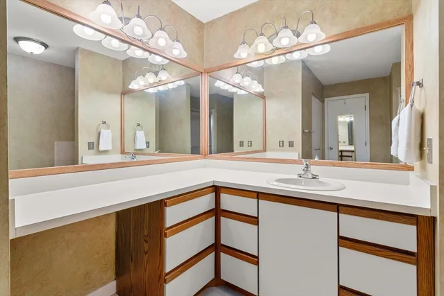 a kitchen with a sink stove and refrigerator