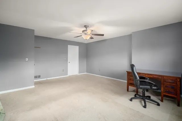 a bathroom with a tub and a shower