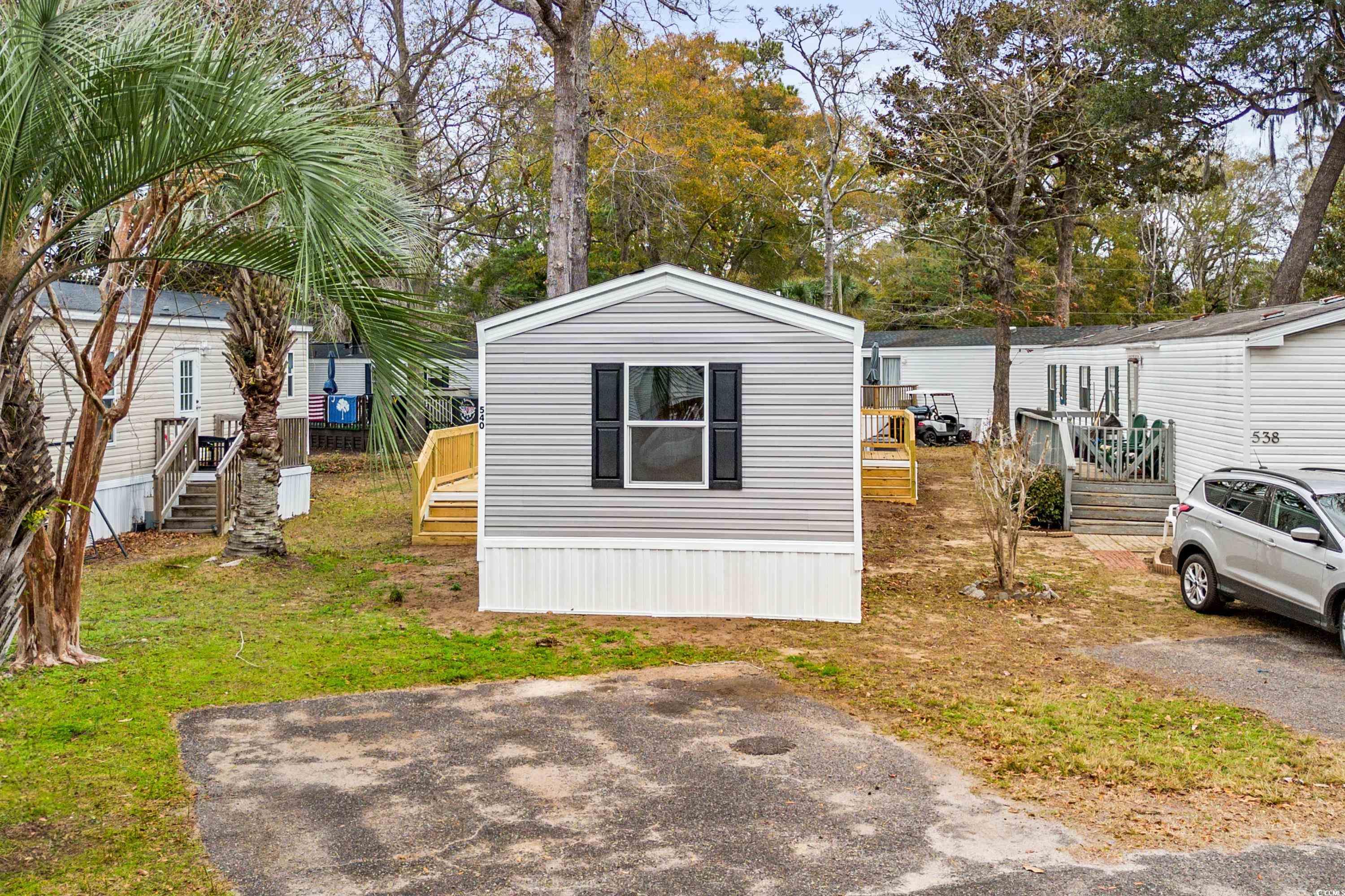540 Key Largo Avenue Murrells Inlet, SC 29576 - Photo 24 of 34 Exterior space with a wooden deck
