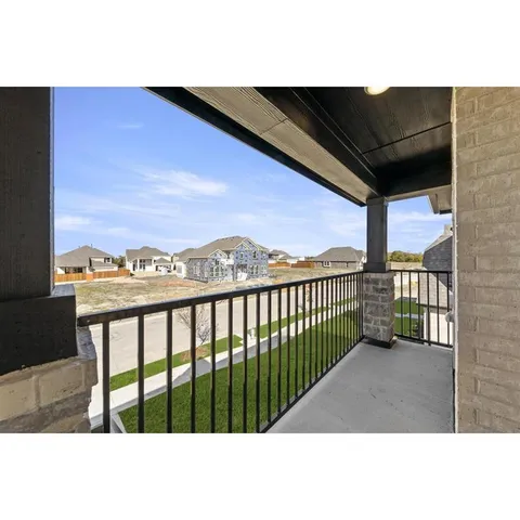 a balcony with a city view