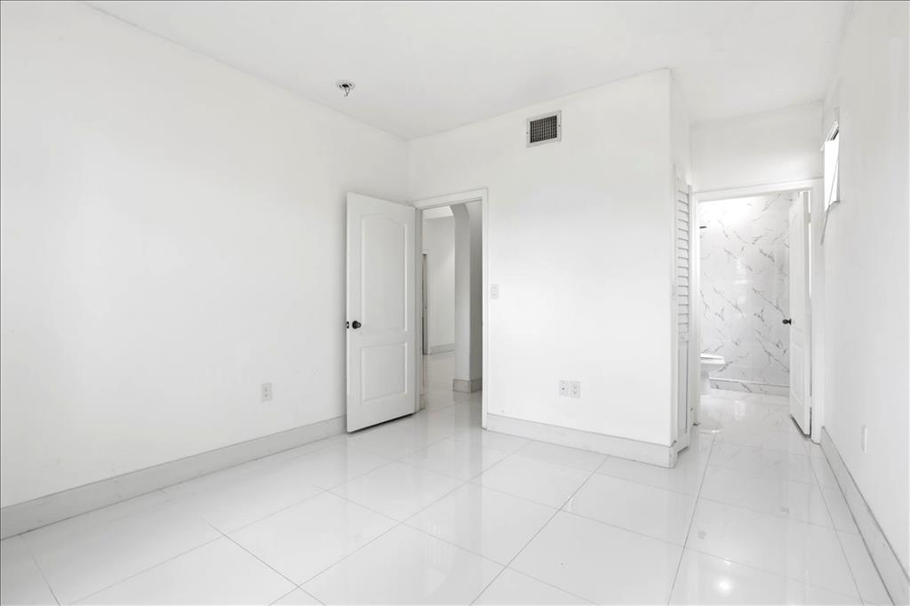 3802 Southwest 165th Terrace Miramar, FL 33027 - Photo 13 of 49 a view of an empty room