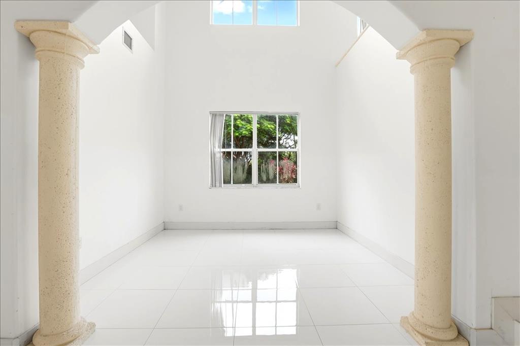 3802 Southwest 165th Terrace Miramar, FL 33027 - Photo 16 of 49 a view of empty room with windows