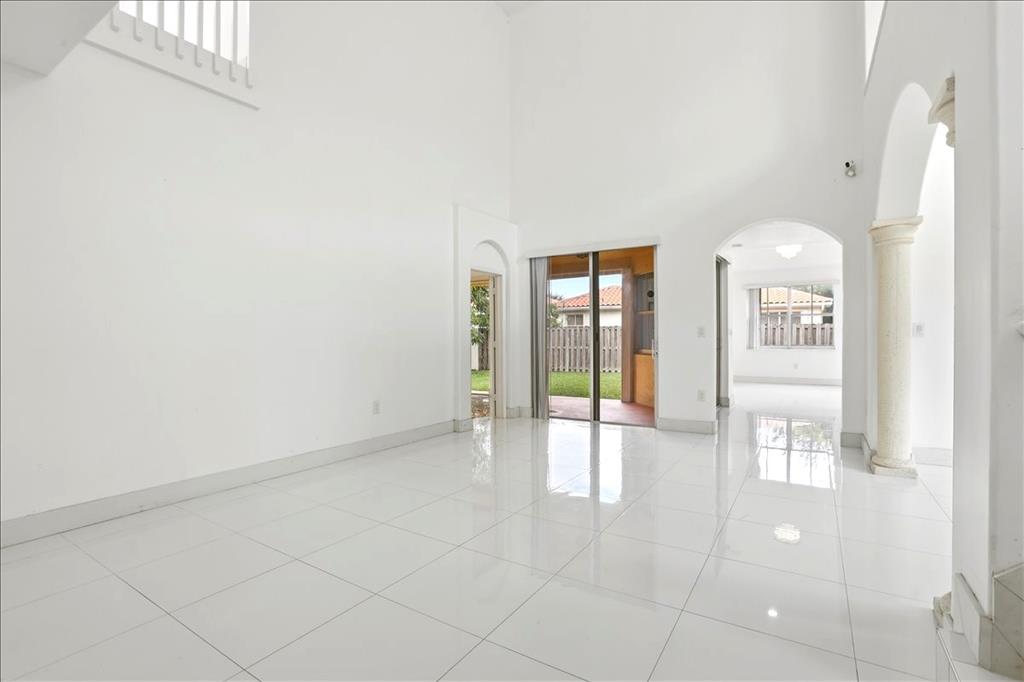 3802 Southwest 165th Terrace Miramar, FL 33027 - Photo 18 of 49 a view of an entryway with wooden floor