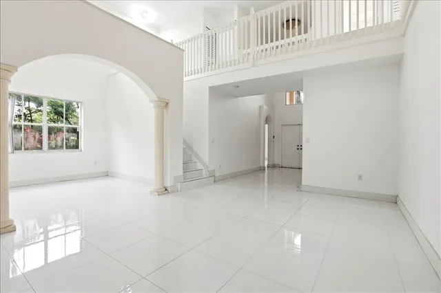 an empty room with windows