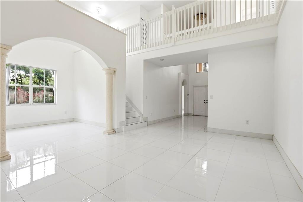 3802 Southwest 165th Terrace Miramar, FL 33027 - Photo 19 of 49 an empty room with windows