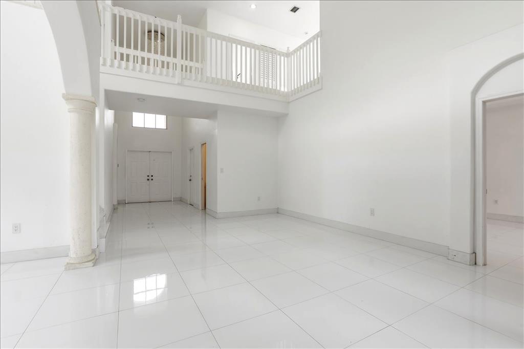 3802 Southwest 165th Terrace Miramar, FL 33027 - Photo 20 of 49 an empty room with windows