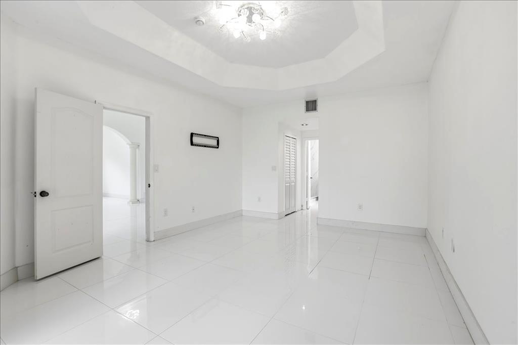 3802 Southwest 165th Terrace Miramar, FL 33027 - Photo 22 of 49 wooden floor in an empty room