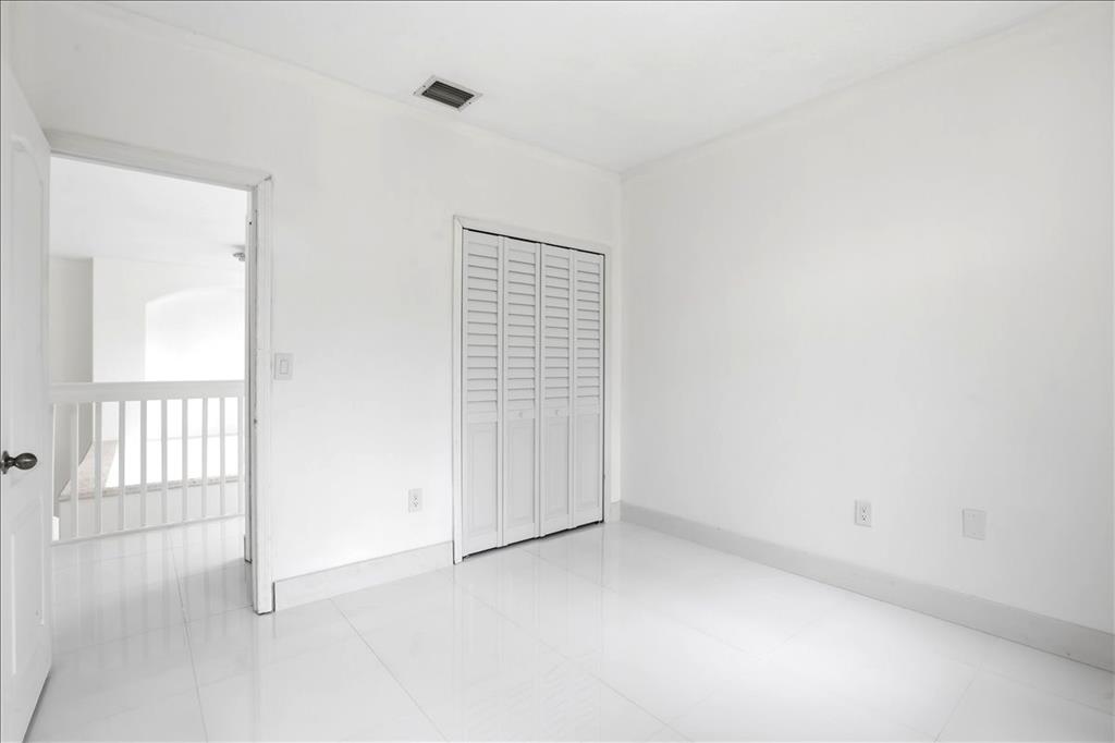 3802 Southwest 165th Terrace Miramar, FL 33027 - Photo 30 of 49 an empty room with windows