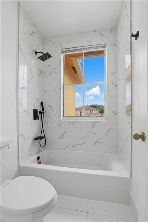 3802 Southwest 165th Terrace Miramar, FL 33027 - Photo 33 of 49 a bathroom with a sink a toilet and a bathtub