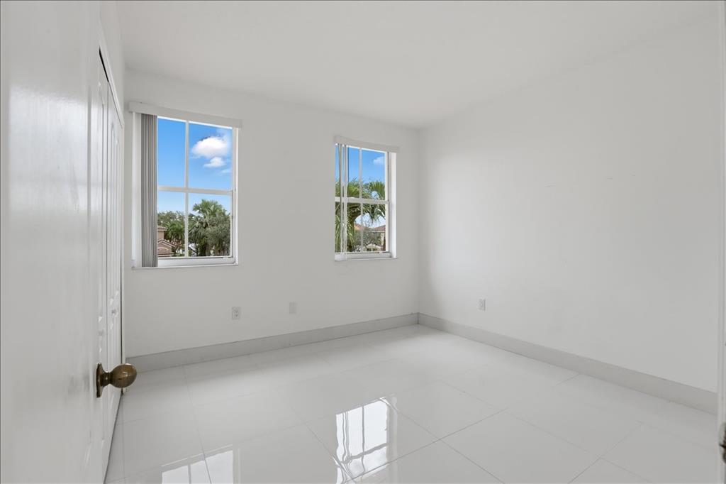 3802 Southwest 165th Terrace Miramar, FL 33027 - Photo 34 of 49 an empty room with windows