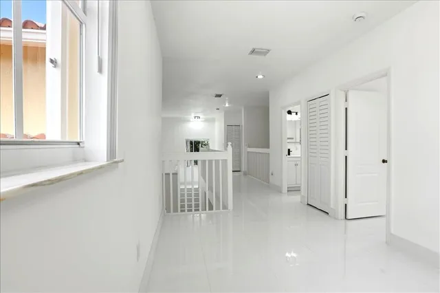 a close view of a stove a sink and dishwasher in a kitchen