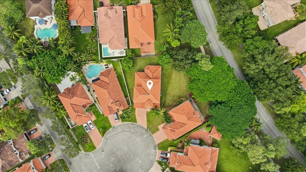 3802 Southwest 165th Terrace Miramar, FL 33027 - Photo 44 of 49 an aerial view of residential house with outdoor space and trees