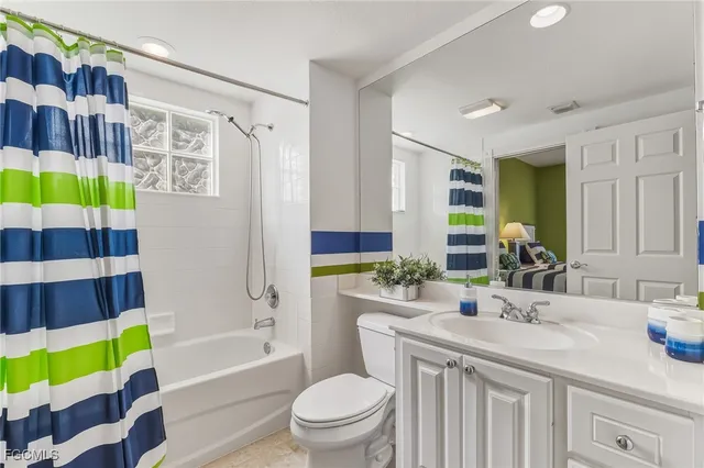 a bathroom with a sink a toilet and a bathtub