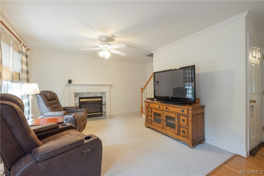 3530 Timberview Road Powhatan, VA 23139 - Photo 16 of 50 a living room with furniture and a flat screen tv