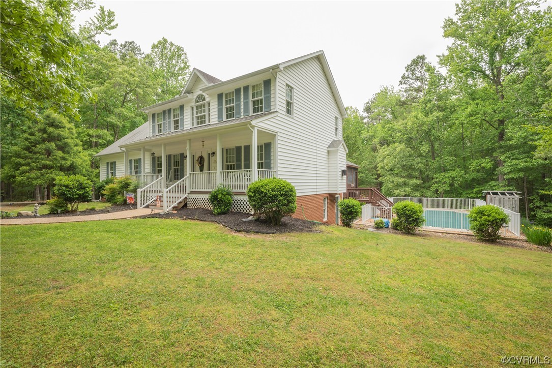 3530 Timberview Road Powhatan, VA 23139 - Photo 2 of 50 a view of a house with a yard and sitting area