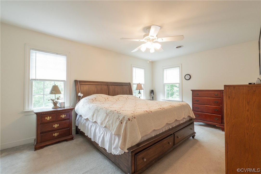 3530 Timberview Road Powhatan, VA 23139 - Photo 22 of 50 a spacious bedroom with a bed and window